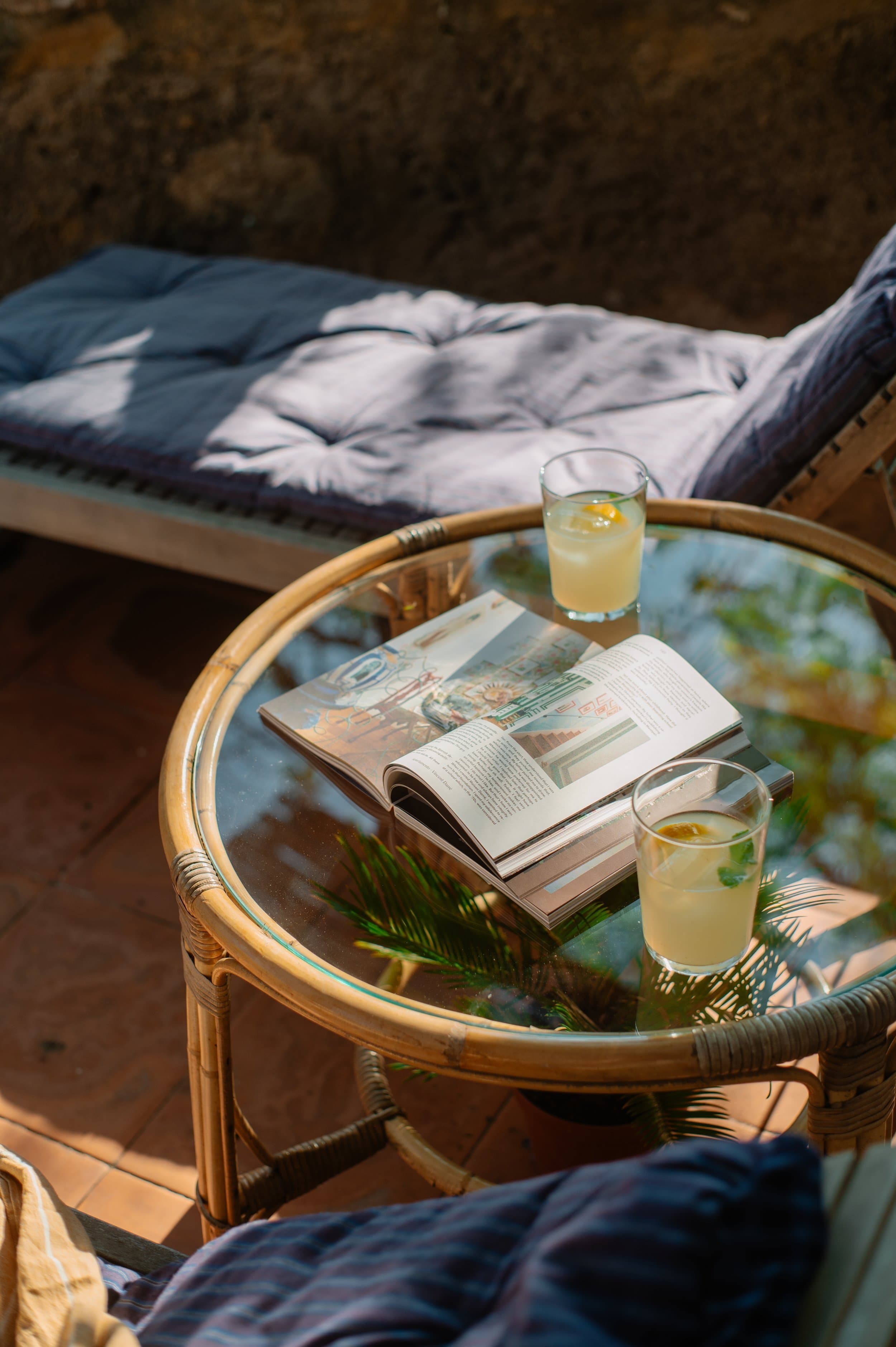 Round wicker table on the terrace