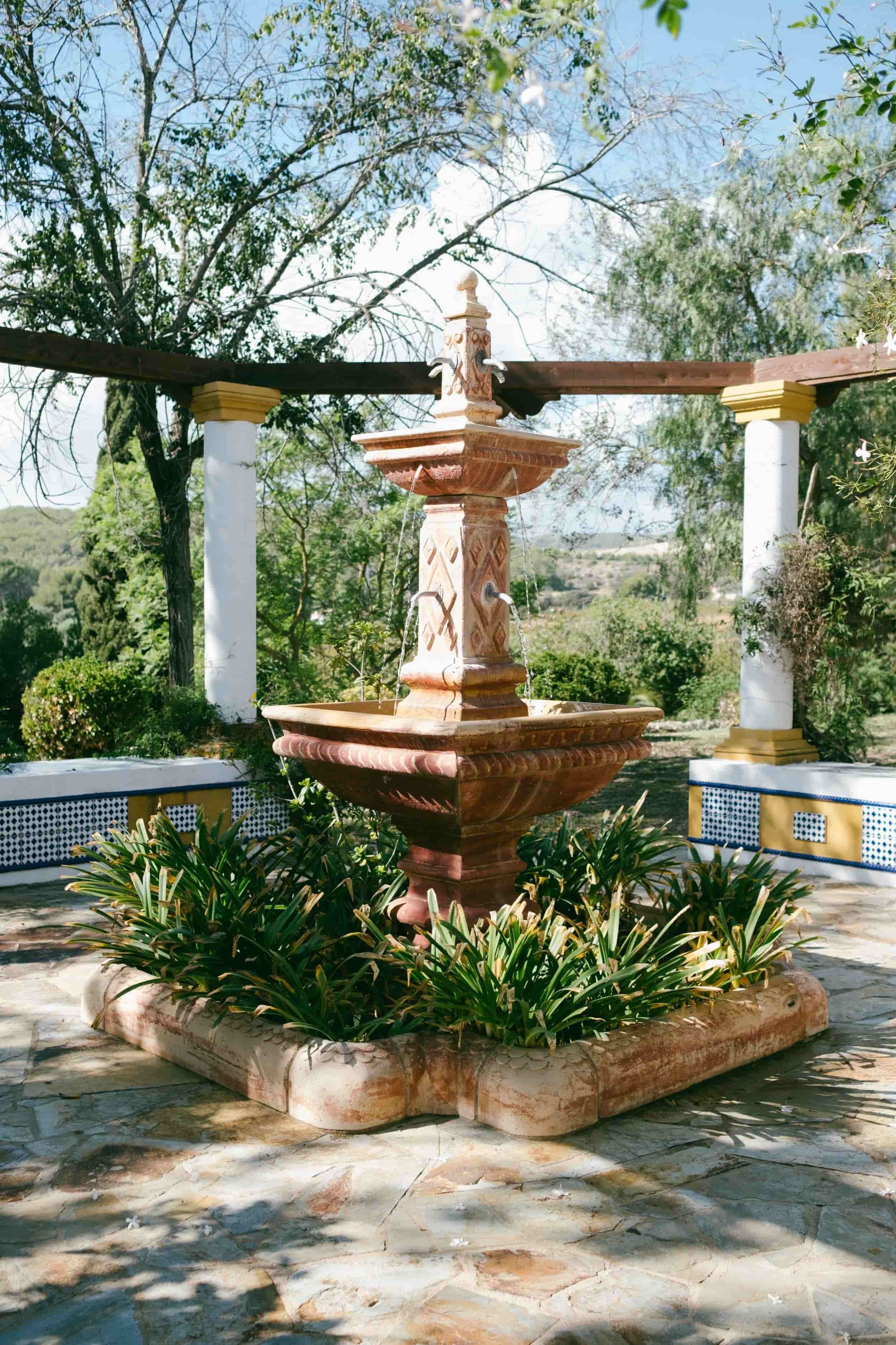 Stone fountain in the botanical garden
